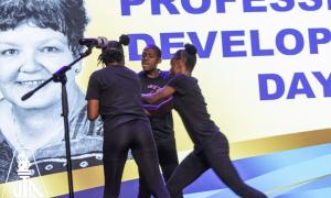 Students of the Marcus Garvey High doing a skit to entertain the over 800 participants in attendance.